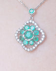 White gold 14k emerald cluster necklace, 4-leaf clover design accented by natural diamonds, crafted in 14k white gold.