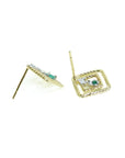 14K yellow gold geometric stud earrings with green emeralds and diamond accents.