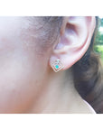 Women's emerald braided stud earrings, 14K yellow gold double kite geometric design with push backs.