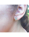 Women's emerald braided stud earrings, 14K yellow gold double kite geometric design with push backs.