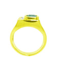 Men's 18K yellow gold ring with a rectangular emerald and channel-set princess-cut diamonds.