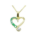18K yellow gold heart pendant with natural emeralds and diamonds on a delicate chain.