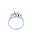 14K white gold engagement ring with a round cut center diamond and two trillion side diamonds.