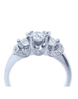 14K white gold three-stone round cut diamond engagement ring with pave accent diamonds.
