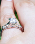 Round diamond and side baguette ring