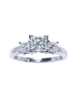 Princess cut diamond ring side diamonds three stone crafted in 14k white gold.