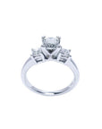 14K white gold ring with a princess cut three-stone diamond design.