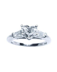 14K white gold heart-cut diamond engagement ring with side baguette diamonds.