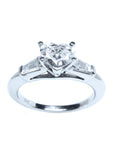 Heart cut engagement ring three stone side bagiette
