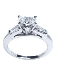 Heart cut and side baguette diamond ring