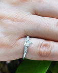 Heart cut and baguettes side diamond ring