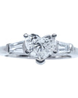 heart cut diamond ring side baguette three stone