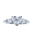 heart cut diamond ring side baguette three stone