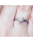 Natural diamond solitaire engagement ring 14k white gold.