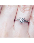 Natural diamond solitaire engagement ring 14k white gold.
