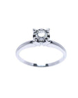 Round cut diamond solitaire engagement ring in 14K white gold with illusion setting.