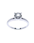 Round cut diamond solitaire engagement ring in 14K white gold with illusion setting.