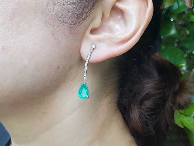 Pear shaped emerald earrings