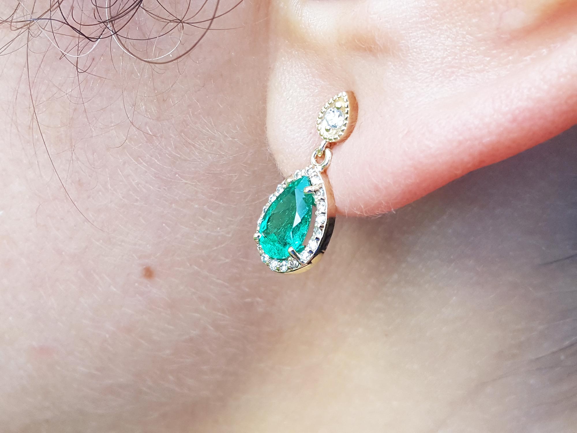 Pear shaped emerald earrings