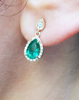 Yellow gold emerald earrings