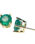 Round cut emerald stud earrings