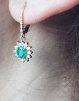 Lever backs emerald dangle earrings