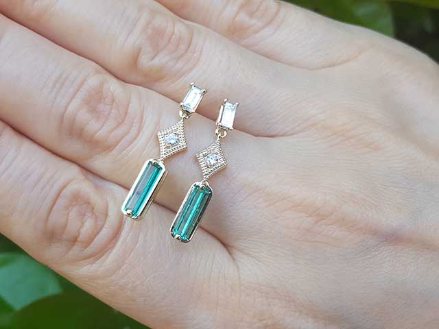 Green fire baguette cut emerald stud earrings
