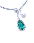 Emerald necklace fine jewelry from the Muzo mines in Colombia, encircled in a halo of natural diamond set in 18k white gold