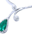 Emerald necklace: this is a natural emerald from the Muzo mines in Colombia, in a halo of natural diamond set in 18k white gold