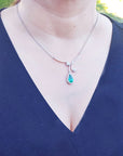 Mother's Day gift emerald necklace, this is a natural emerald source from the Muzo mines in Colombia, in a halo of natural diamond