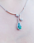 Emerald bridal necklace, natural emerald from the Muzo mines in Colombia, in a halo of natural diamond set in 18k white gold