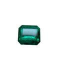 Vivid green emerald cut Colombian emerald gemstone.