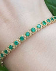 Solid yellow gold bracelet with emerald