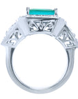 Anillo de oro blanco con esmeralda para mujer