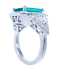 Anillo con esmeralda y diamantes en oro de 18k