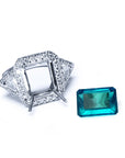 Anillo de oro blanco con esmeralda