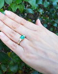 Emerald and princess cut diamonds engagement rings
