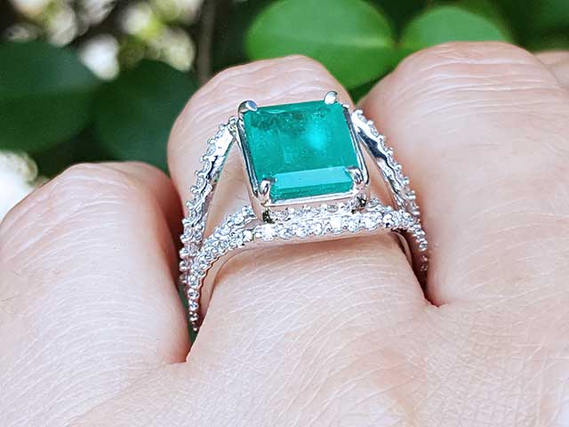 Emerald and diamond engagement rings