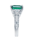 Brides' emerald and diamond engagement ring