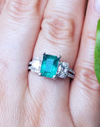 Emerald and diamond engagement ring