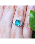 Emerald and diamond engagement ring