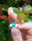 Emerald-cut emerald ring