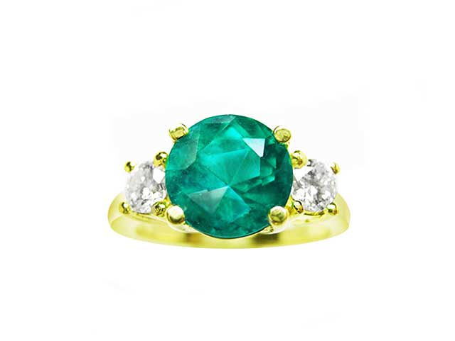 Round cut emerald ring
