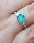 Emerald and baguette diamonds engagement rings