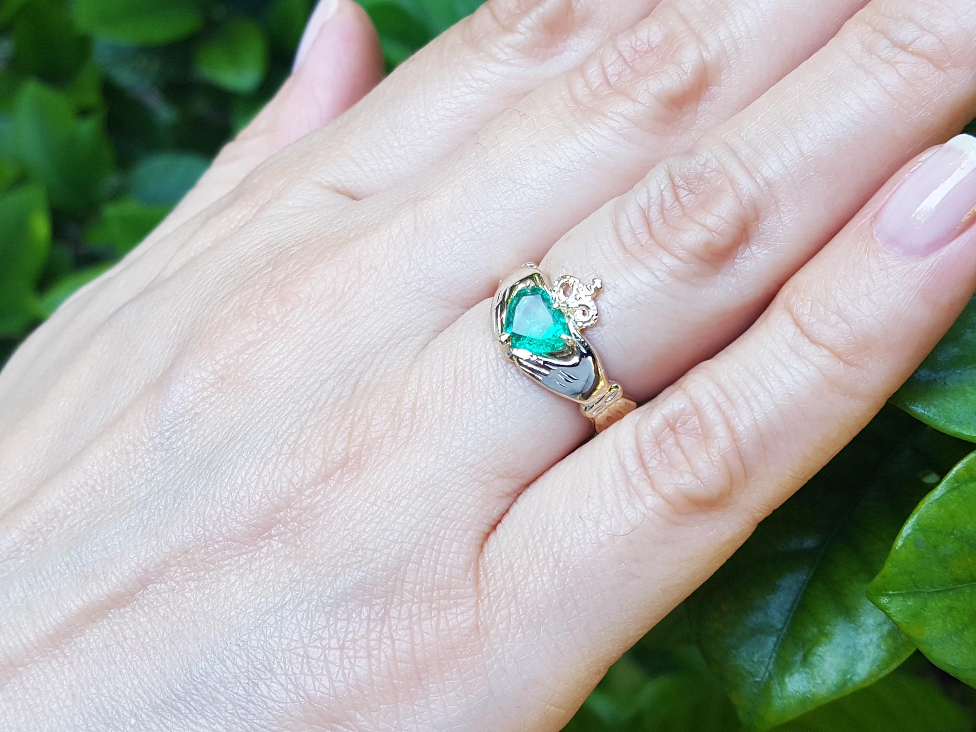 Emerald claddagh ring for women