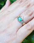 Emerald claddagh ring for women
