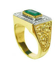 Solid yellow gold ring with emerald
