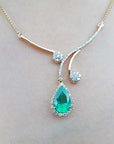 Yellow gold emerald necklace