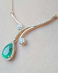 Pear cut necklace and halo diamond
