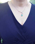 Pear cut emerald necklace